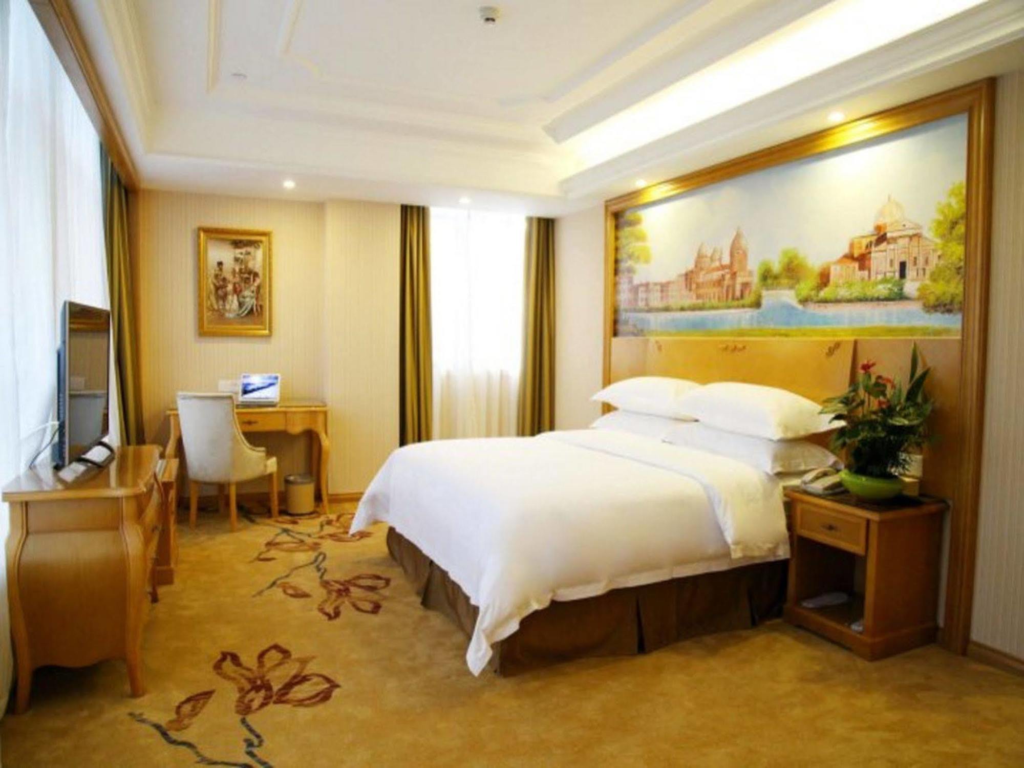 Vienna International Hotel Meizhou Spindle Bridge Branch Екстер'єр фото